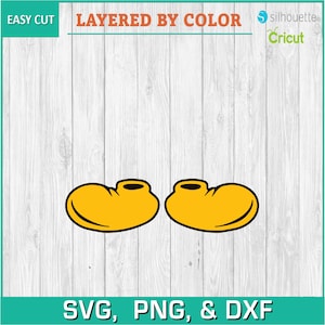 Può includere: Due scarpe da cartone animato gialle con contorni neri. Le scarpe sono su uno sfondo di legno bianco. Il testo "LAYERED BY COLOR" è nella parte superiore dell'immagine.