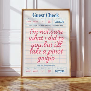 May include: A pink and white guest check with blue and black text. The text says "Guest Check" and "i'm not sure what i did to you but i'll take a pinot grigio".