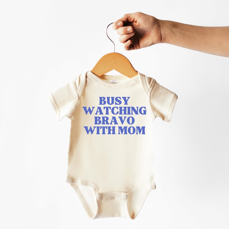 Busy Watching Bravo with Mom | Infant Onesie image 1