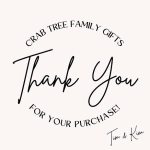 May include: A cream-colored graphic with the words "Thank You" in a flowing black script. The text "CRAB TREE FAMILY GIFTS" arches above, and "FOR YOUR PURCHASE!" is below. The signature "Tim & Kim" appears at the bottom.