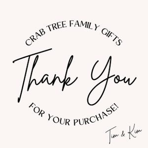 May include: A cream-colored graphic with the words "CRAB TREE FAMILY GIFTS" in a circular arrangement at the top. The words "Thank You" are in a large, elegant script, with "FOR YOUR PURCHASE!" below. The signature "Tim & Kim" is at the bottom.