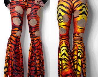 Metal Threads 1983 Tiger Pants, legginsy ze spandexu, z rozszerzanymi nogawkami, ze zwierzęcymi frędzlami, sznurowane, glam rock, David Lee Roth, Van Halen, lata 80.