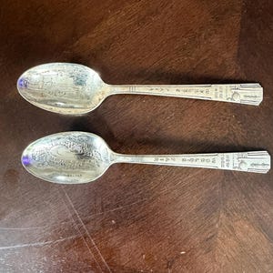 Rare Pair of 1939 world fair spoons. Transporting building, New York State amphitheater