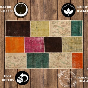 May include: A rectangular patchwork rug with various colored squares, including brown, orange, pink, and green. The rug is machine washable, cotton-backed, and stain-free. It is suitable for robot vacuums and has a non-slip design.