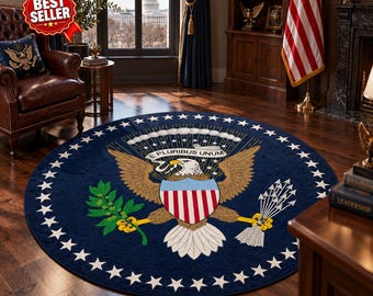 May include: A circular navy blue rug featuring the Seal of the President of the United States. The design includes a central bald eagle holding an olive branch and arrows, a shield with red and white stripes, and a banner with the text E PLURIBUS UNUM.