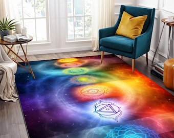 May include: A colorful rug with a galaxy design and seven chakras, each with a different color and symbol. The chakras are arranged in a spiral pattern, and the rug is set against a white wall and a blue armchair.