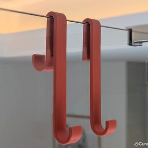 Minimalistischer Haken für die Dusche: Langer Handtuchhalter für die Glasduschwand