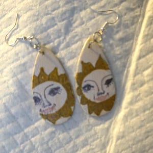 Handpainted wooden earrings sun faces. dangle.