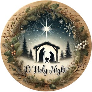 May include: Round wooden Christmas decoration featuring a Nativity scene under a starry night sky. The scene is framed by a wreath of evergreen branches, holly, and berries. The words "O Holy Night" are written in elegant script at the bottom.