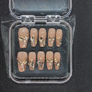 Taupe color with gold rhinestone