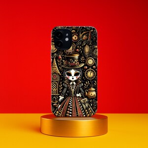 May include: Black iPhone case featuring a whimsical illustration of a doll in a top hat and Victorian-style dress. The design includes clocks, a teapot, and a checkerboard pattern, set against a dark background with gold accents. The case is displayed on a gold stand.