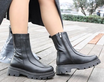 Botas de inverno pretas de couro com forro de pele | Botas femininas de salto grosso