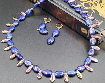 Conjunto de joyas de lapislázuli azul profundo con lágrimas doradas