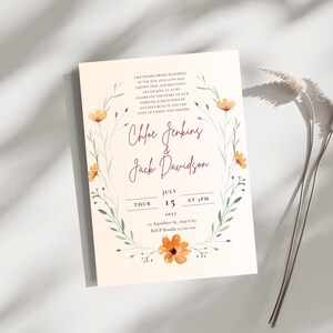 May include: A wedding invitation with a floral wreath design. The invitation is for Chloe Jenkins and Jack Davidson, and it is set for Thursday, July 15th, 2027 at 3 PM. The invitation includes the address and RSVP information.