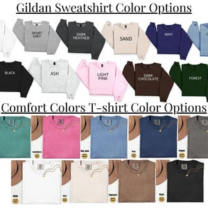 K&ouml;nnte beinhalten: Bild mit Farboptionen f&uuml;r Gildan-Sweatshirts und Comfort Colors-T-Shirts. Die Sweatshirts werden in verschiedenen Farben wie Wei&szlig;, Grau, Schwarz, Rosa und Blau gezeigt. Die T-Shirts werden in Gr&uuml;n-, Rosa-, Blau- und Braunt&ouml;nen pr&auml;sentiert.
