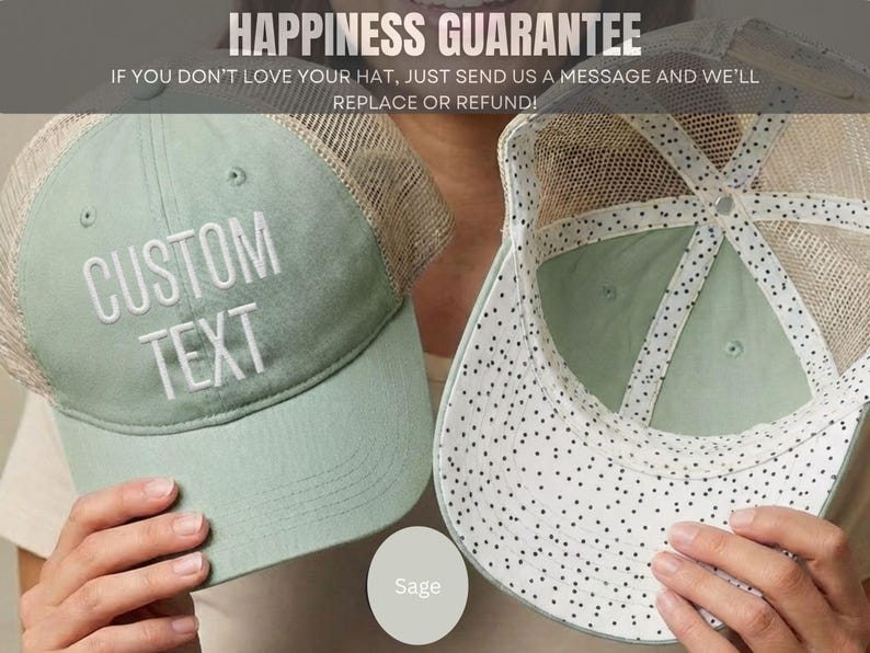 May include: A sage green trucker hat with a mesh back and white embroidered text that reads CUSTOM TEXT. The interior of the hat features a white lining with a black polka dot pattern. The hat has a structured front panel and a curved brim.