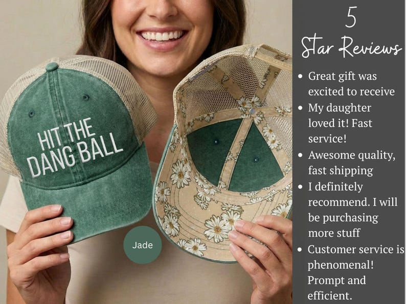 May include: A green trucker hat with a mesh back and the white text HIT THE DANG BALL on the front. The interior of the hat features a beige lining with a white daisy floral pattern. The hat has a structured front panel and a curved brim.