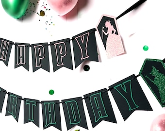 May include: Black and green "Happy Birthday" banner with pink and green glitter accents. The banner features a silhouette of a princess in a coffin.