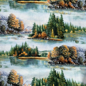 May include: Fabric with a repeating pattern of a serene lake scene. The design features trees with green and orange foliage, rocky shores, and a calm, reflective body of water. The background includes distant mountains and a cloudy sky.