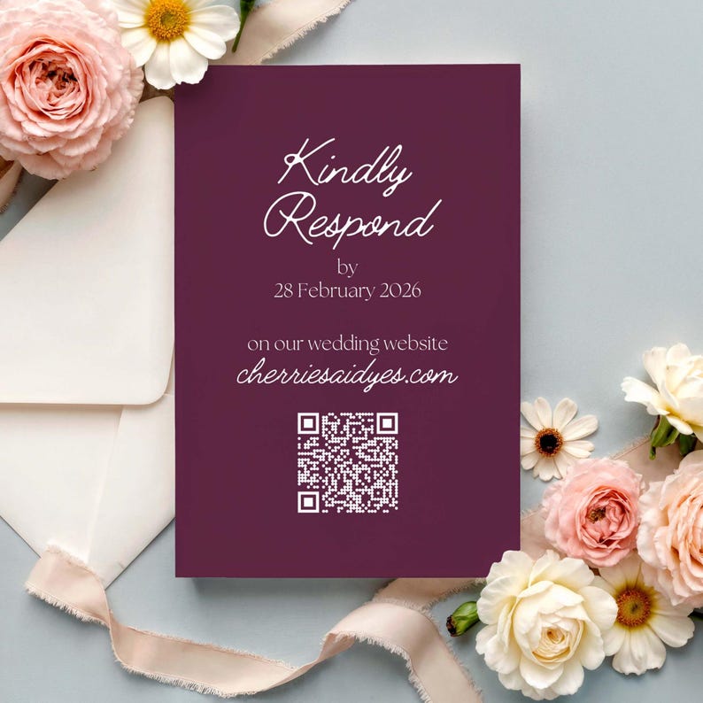 May include: A deep purple wedding invitation card with white calligraphy reading "Kindly Respond by 28 February 2026." The card also features a website address and a QR code. The card is decorated with flowers and an envelope.