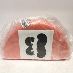 2 Snack Keepers Tupperware Orange with Mustache sticker and Eyebrow sticker, NEW in Plastic as shown. Folded lunch Keeper Set