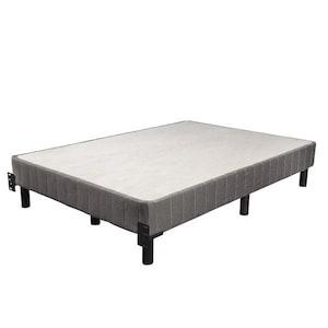 May include: A gray upholstered bed frame with a white fabric top and black metal legs.