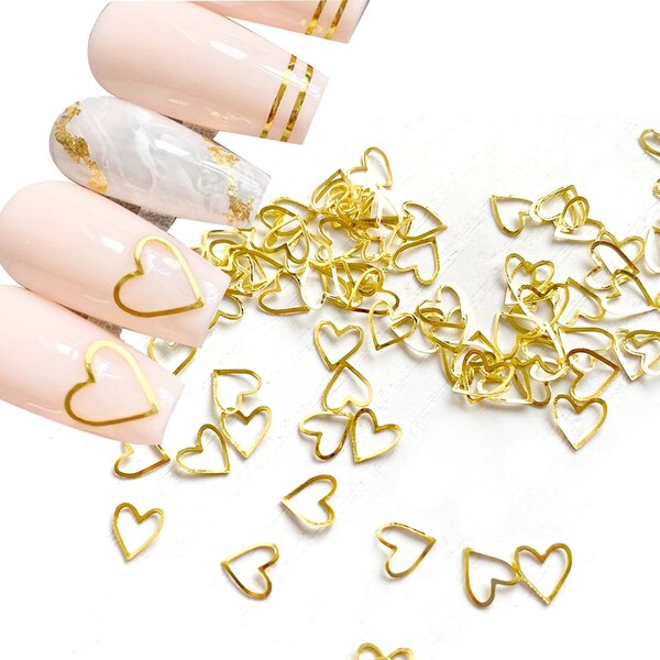 100pcs Coeur Métal Nail Art Stud Hollow Gold / Sliver Rivet Charms DIY Nails Accessoires 3D Nail Art Décorations