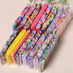 Lot 50Pcs Nail Art Decorations Fruit Flower Feather Fimo Canes Stick Rods Polymer Clay Stickers Nails Tips Manicure Accessories New