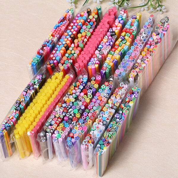 Lot 50Pcs Nail Art Décorations Fruit Flower Feather Fimo Canes Stick Rods Polymer Clay Stickers Nails Conseils Manucure Accessoires Nouveau