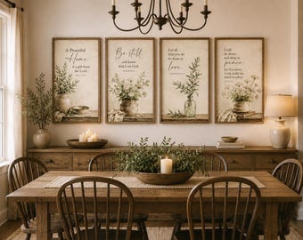 May include: A set of four rectangular wall art prints in wooden frames, each featuring botanical illustrations of flowers and greenery in vases with inspirational text including A Peaceful Home, Be still, Let all that you do be done in love, and I will lie down and sleep in peace.