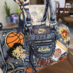 Bolso de mano de mezclilla azul imagen 2
