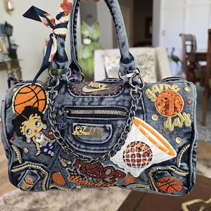Bolso de mano de mezclilla azul imagen 1