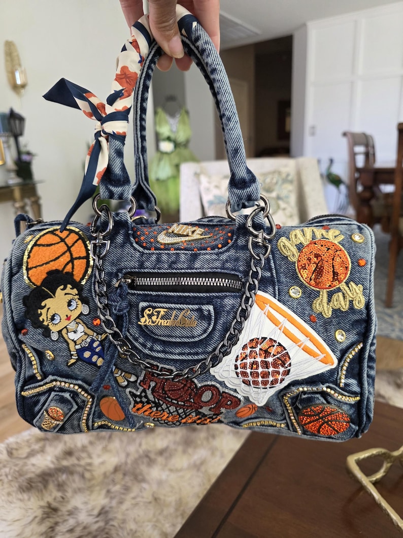 Bolso de mano de mezclilla azul imagen 1