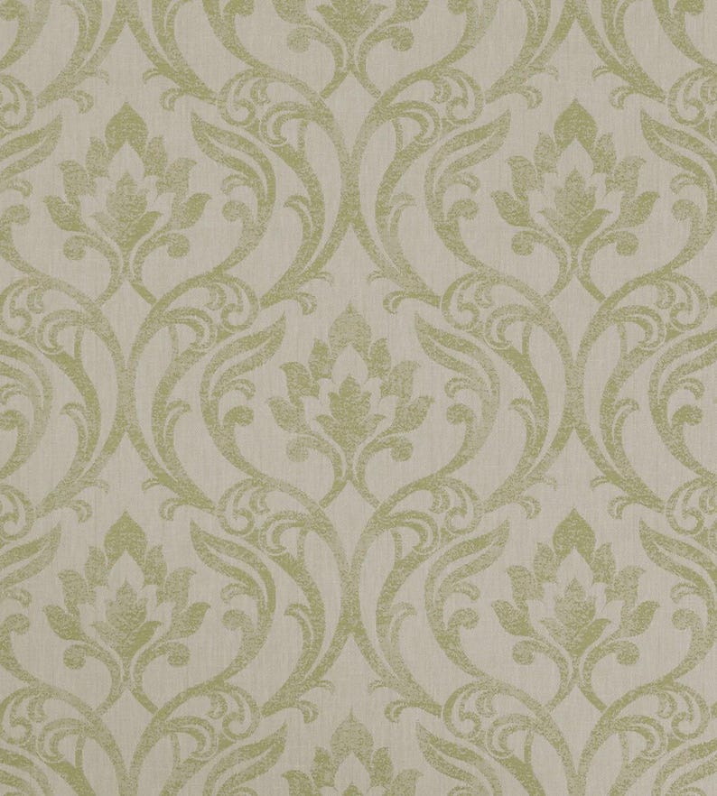 May include: A repeating floral damask pattern on wallpaper, in light green and beige. The design has a textured appearance, with a subtle, vintage aesthetic. The pattern is seamless.