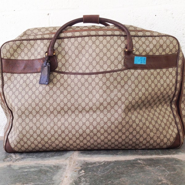 Vintage 1970s Large Gucci Luggage Bag. Soft Sided Canvas Coated & Brown Leather Trim. Jetset Distressed. ID Tag.