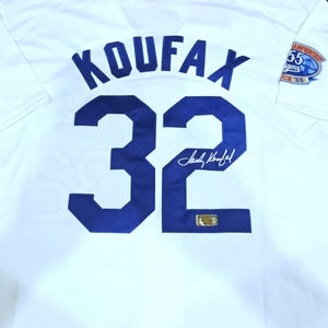 Camiseta firmada de los Dodgers de Los Ángeles por Sandy Koufax con certificado de autenticidad.