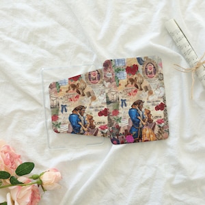 May include: Clear phone case and phone cover with a colourful collage design. The design features a couple, roses, and text, including the words "love" and "Her". The case and cover are on a white surface.