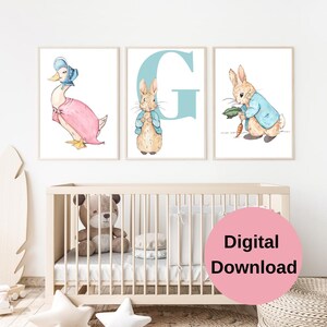 May include: Three printable nursery art prints featuring Peter Rabbit, a duck, and the letter G. The prints are in a watercolor style and have a light blue background.