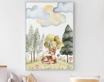 May include: Watercolor painting of a fawn resting in a forest scene. The artwork features a light brown deer with white spots, surrounded by green and yellow trees, mushrooms, and a soft yellow sun and blue clouds in the background. The art is framed.