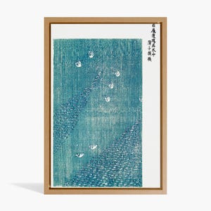 by Taguchi Tomoki – Swans on Blue Lake Japanese Vintage Woodblock Print  | Japan Wall Art, Minimalist Poster, Yatsuo no Tsubaki Canvas Print