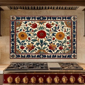 May include: A decorative floral tile backsplash with red, yellow, and blue flowers and foliage. The backsplash is installed above a red and gold stove in a kitchen with dark wood cabinets and a matching range hood.