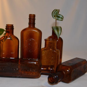 Lot of 6 Antique Small Apothecary Glass Bottles, Used in Italy Between the Years 1930 and 1970.