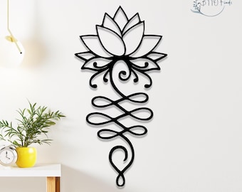May include: Black and white line art wall decor featuring a stylized lotus flower with a swirling design below. The design is reminiscent of a yoga symbol.