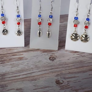 Red, white and blue sports themed earrings