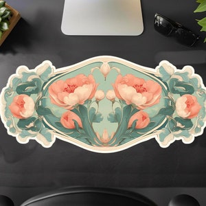 May include: A decorative sticker featuring a floral design with pink peonies and green leaves on a teal background. The sticker is shaped like an oval and has a white border.