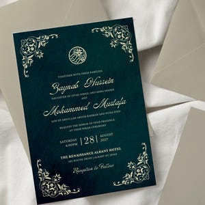 May include: A teal blue wedding invitation with gold calligraphy announcing the marriage of Zaynab Hussein and Mohammed Mustafa. The invitation includes the date, time, and location of the ceremony at The Renaissance Albany Hotel.