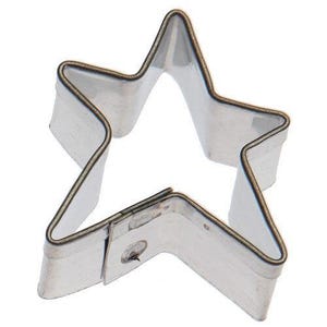 May include: A silver-colored star-shaped cookie cutter. The cutter is made of metal and has a folded edge. The star has five points and is open in the center. The cutter is designed for baking and crafting.
