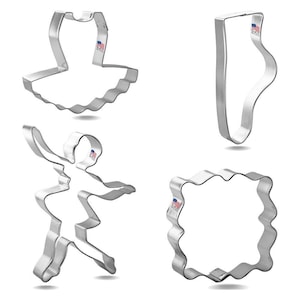 May include: Set of four metal cookie cutters shaped like a ballerina, a tutu, a ballet shoe, and a square frame. The cutters are made in the USA.