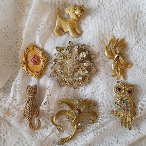 Choose - Vintage Rhinestone brooch. Animal and flourish pin back brooches