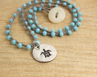 Crocheted Necklace with a Greige Cord, Tiny Turquoise Crystal Beads and a Pendant with a Sea Turtle Design SN-345